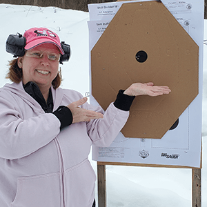 holly with shooting target